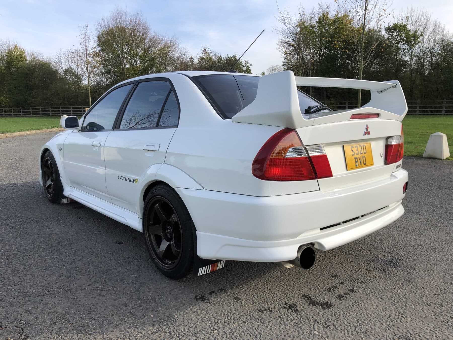 White Mitsubishi Evo performance car